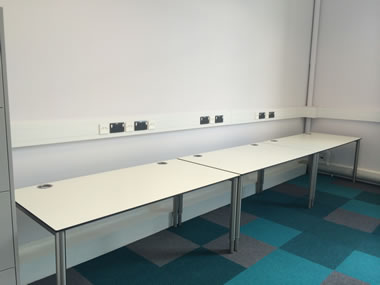 Height adjustable tables
